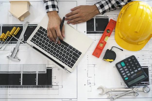 Civil engineer working on his laptop.