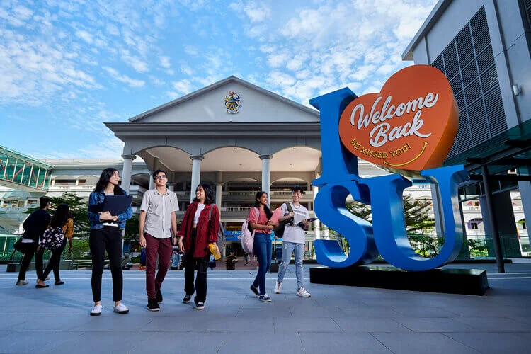 Students at Sunway statue.