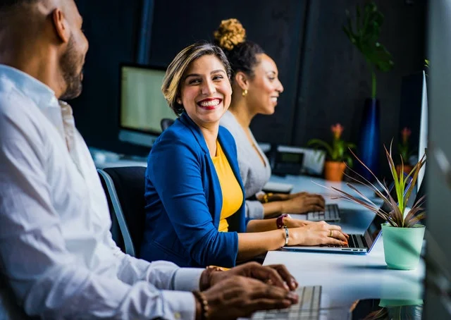 Businesswoman smiling at the camera.