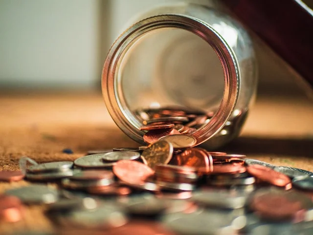 Jar with coins.